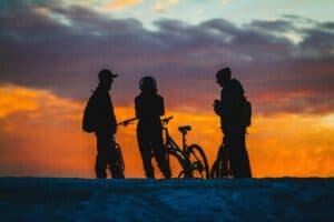 a group of mountain bikers socializing