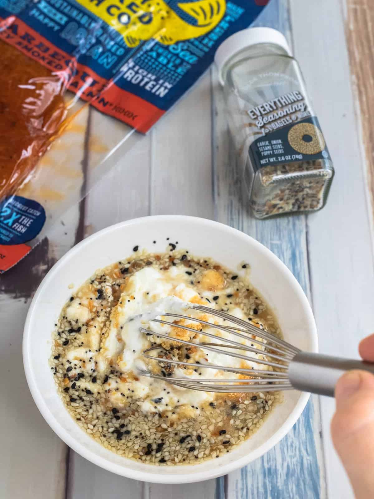 Everything bagel yogurt dressing being whisked together