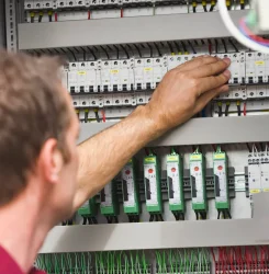 germany-munich-technician-checking-switch-button-2024-09-16-13-05-15-utc