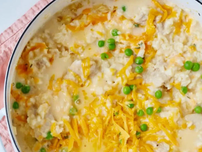 a pot with creamy cheesy rice