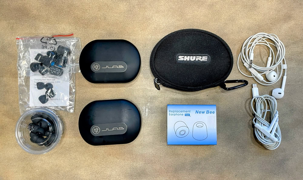 a variety of headphones and ear foam replacements