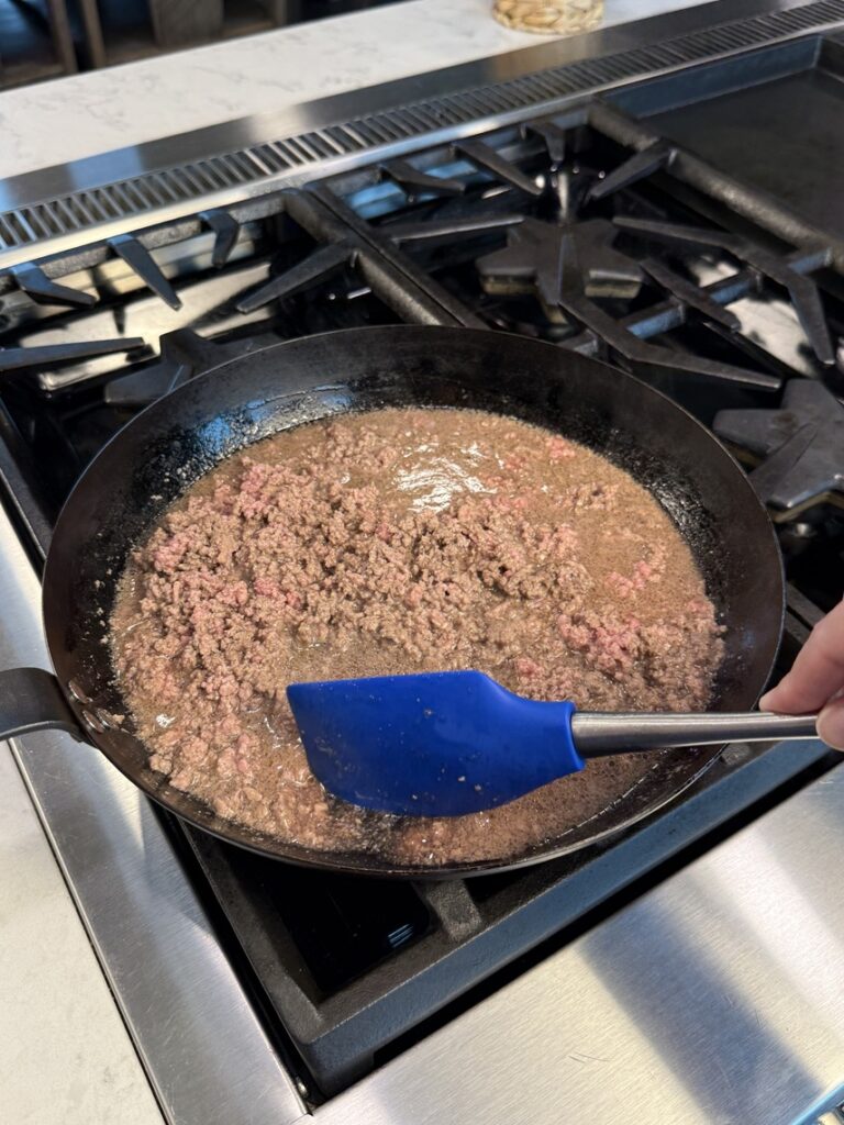 cooking the meat - still a little pink