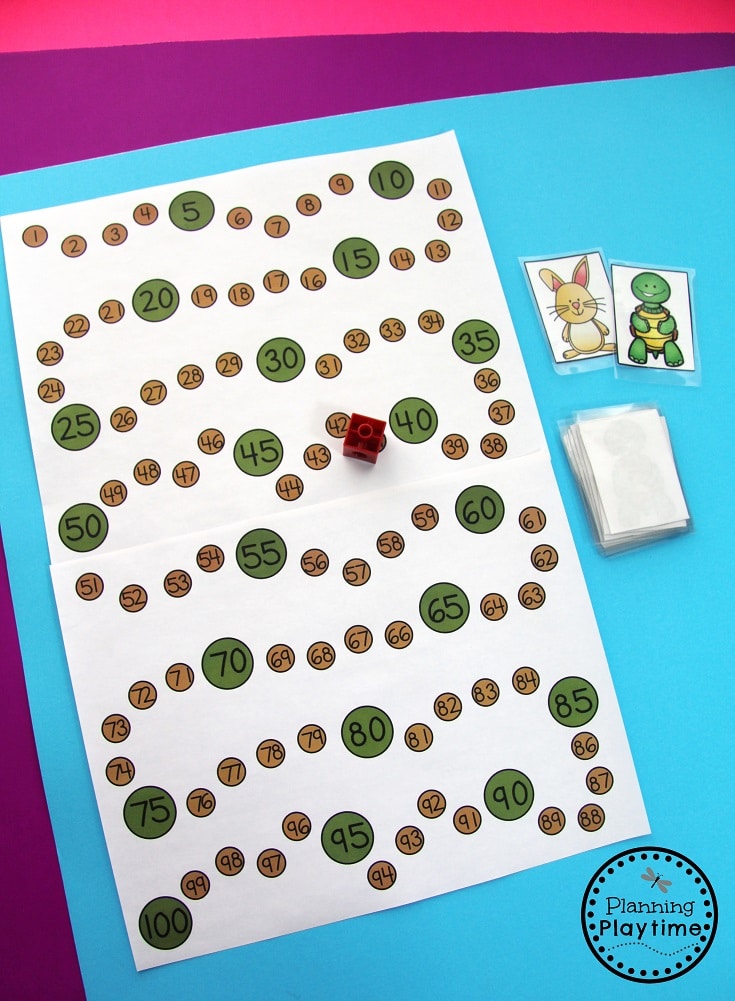 Counting by 10s and 1s. Move 10 spaces if you get a rabbit. Move 1 space if you get a turtle.
