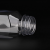The neck of this 350 ml (12 oz) square clear empty juice bottle