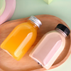 The 250ml 8oz round juice bottle with a tamper-evident cap provides a good seal, and looks great laid flat on a table.