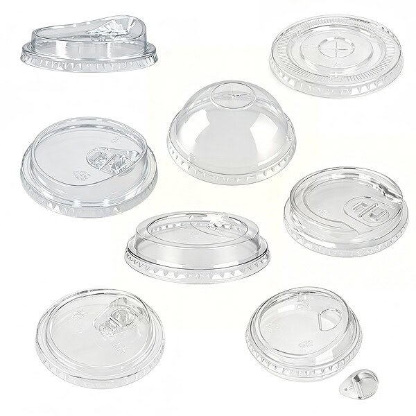 Transparent plastic dome lids for food containers, ideal for beverages and takeaway packaging.