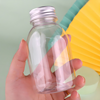 Clear plastic bottle with silver cap, eco-friendly packaging.