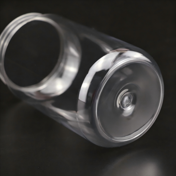 Clear plastic cans with aluminum easy-open lid for beverages or products.