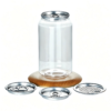 Clear PET soda can with easy open lid on wooden stand with additional lids.
