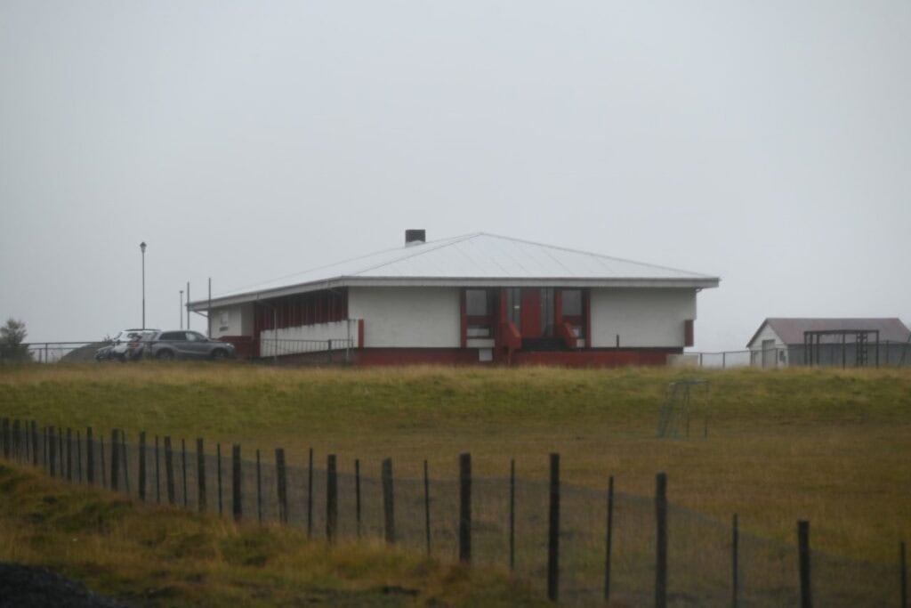 Húsavík to Hvitserkur landscape with a building and foggy weather in Iceland.
