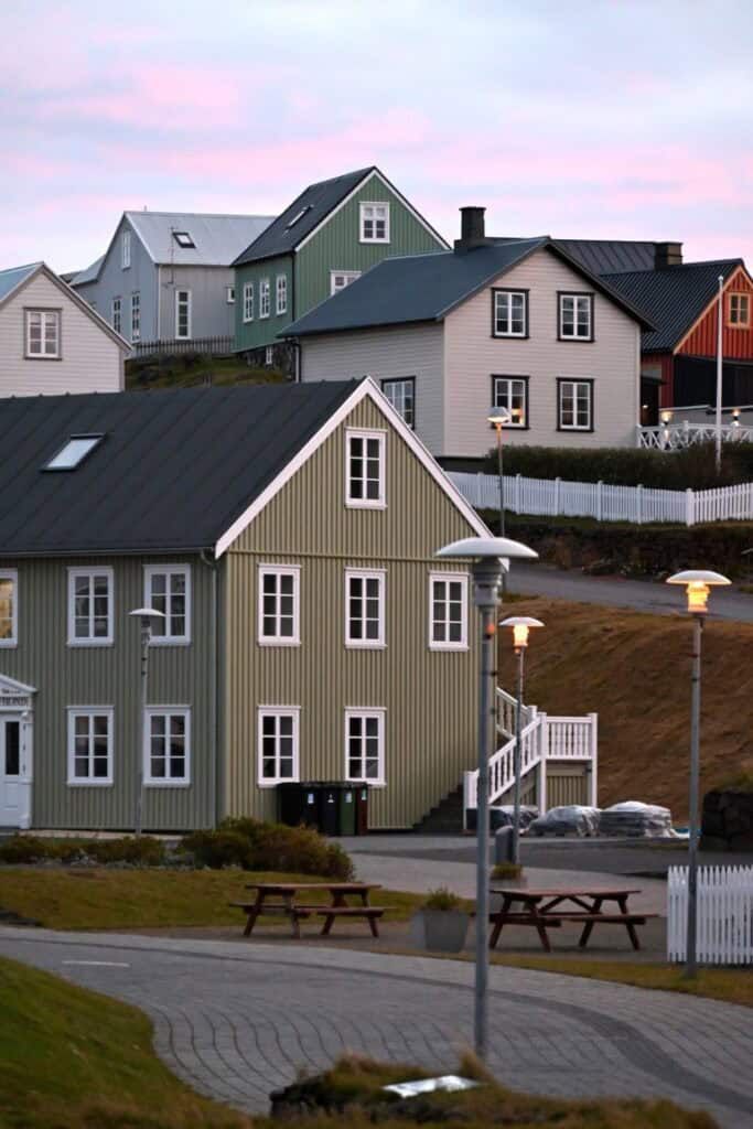 Vibrant Icelandic houses in Westfjords near Witchcraft Museum, scenic coastal village.