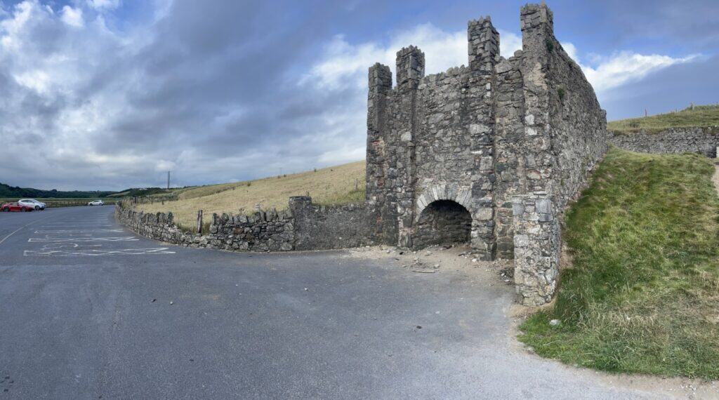 Ruins of a historic Irish castle along the Copper Coast, Cork, Ireland.