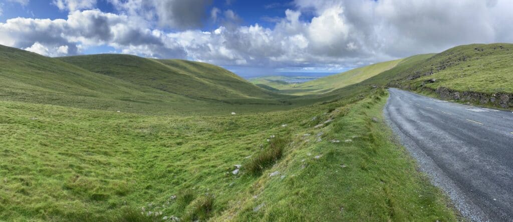 Scenic Irish countryside from Dublin to Cashel with rolling green hills and open roads. Perfect for.