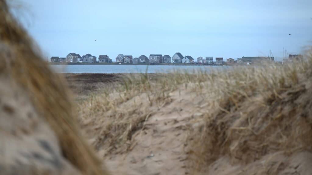 Scenic view of Îles-de-la-Madeleine with houses along the coast in May.