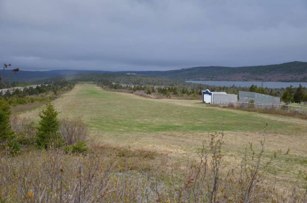 Harbour Grace Airfield, historic site of North America's first civilian airport, surrounded by sceni.