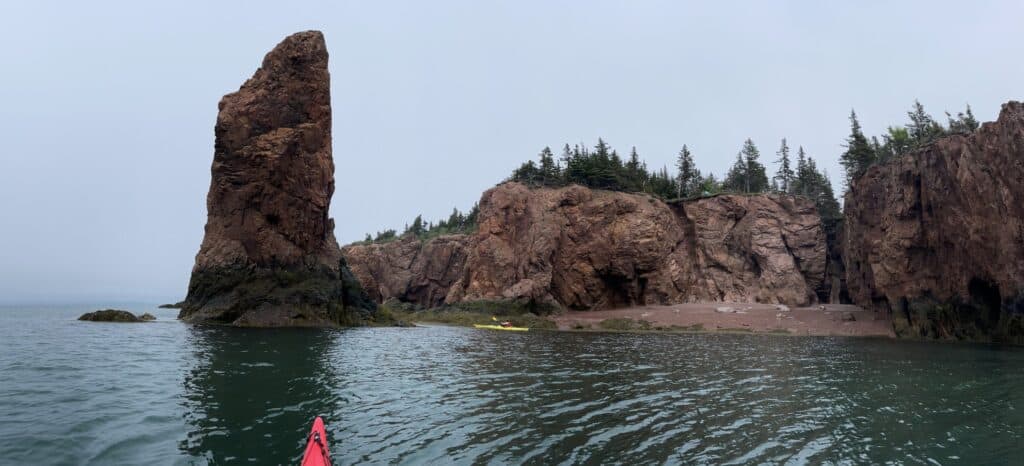 Scenic view of the Three Sisters rock formation along the coast.