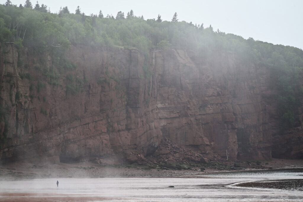 Scenic view of cliffs and mist along the river at Three Sisters.