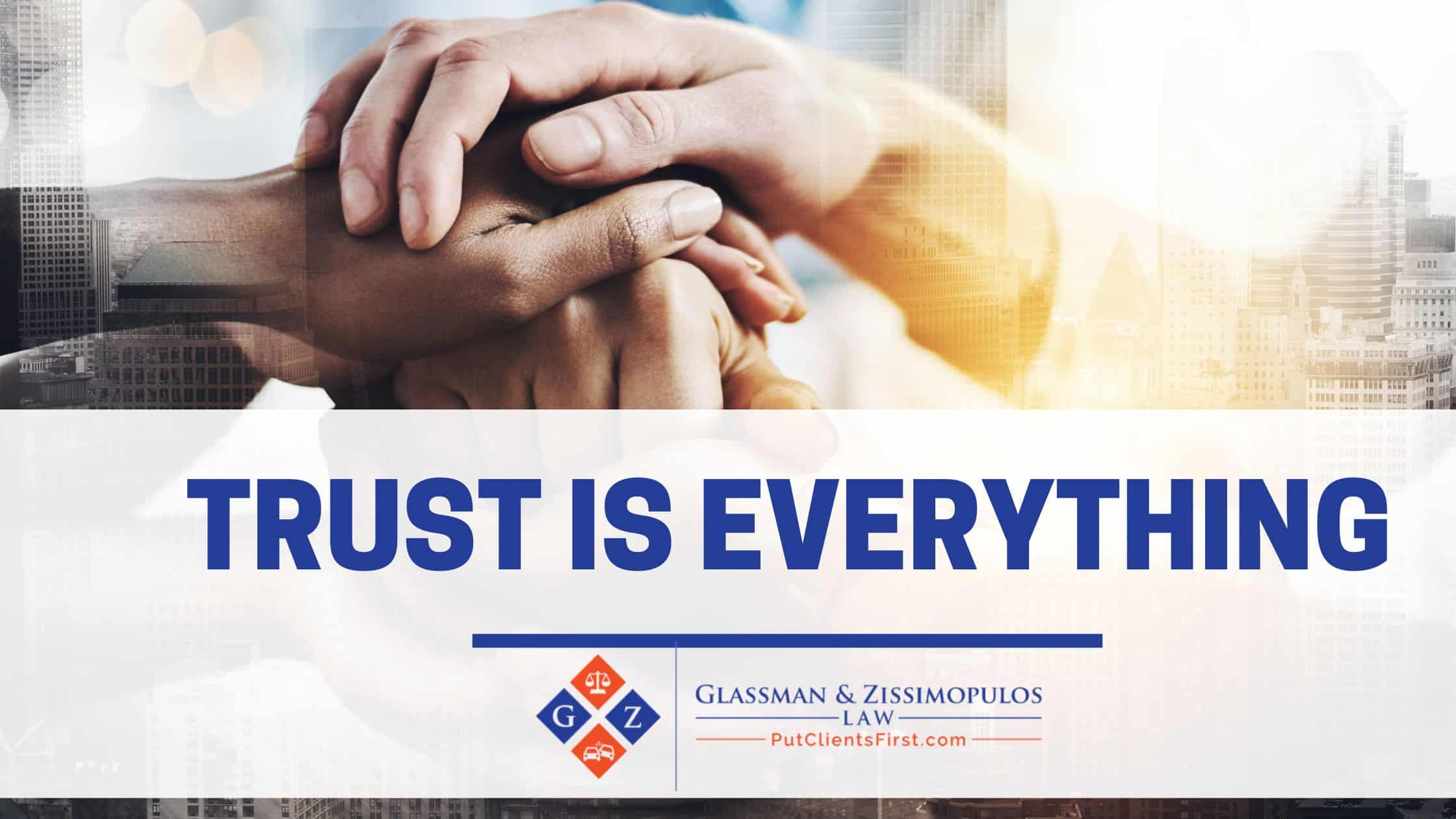 Compassionate handshake representing trust in legal services at Glassman & Zissimopulos Law Firm.