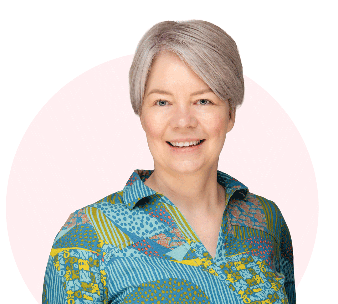 Lenke Kiss Founder Redcurrant Services wearing a blue and green patterned top