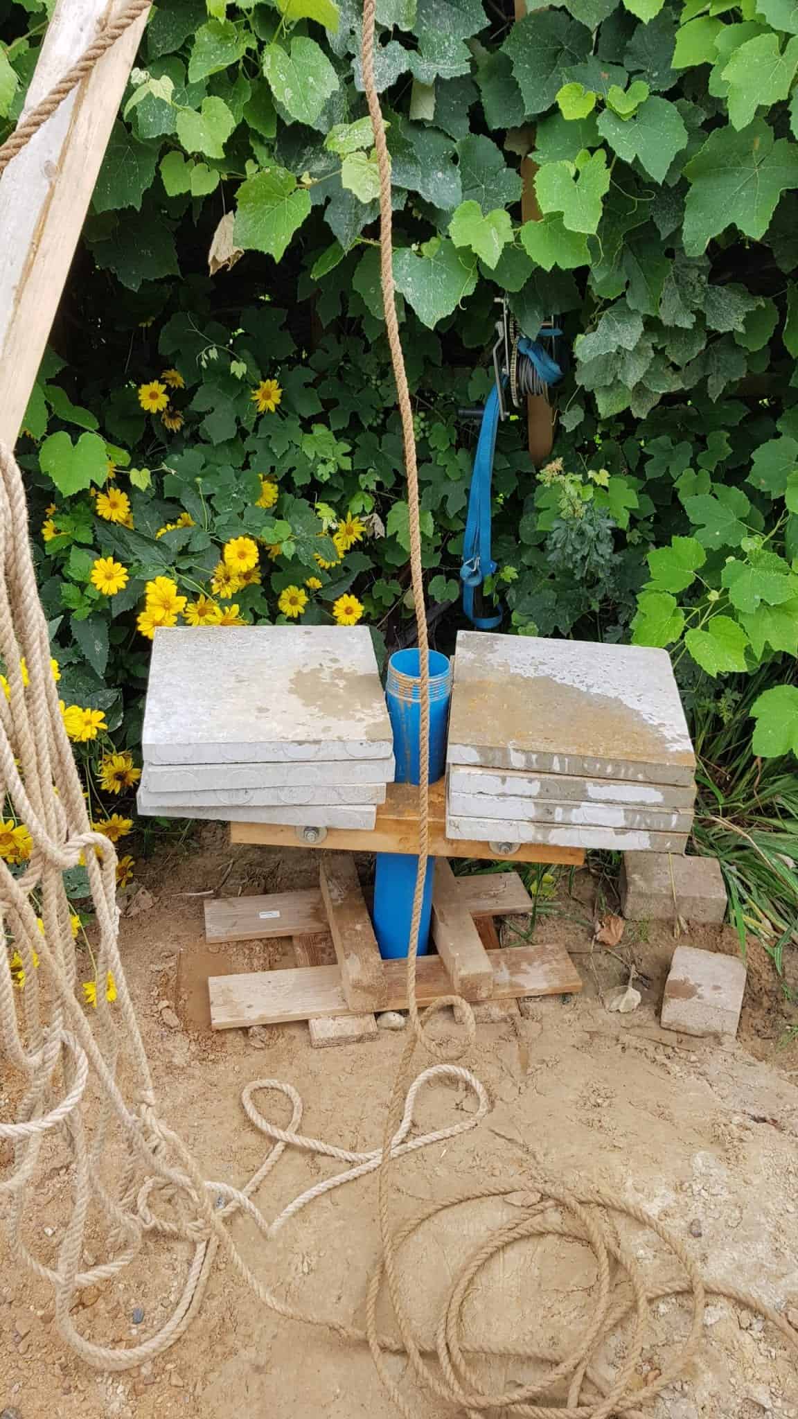 Brunnen bohren holzklemme dreibein kiespumpe plunschen 