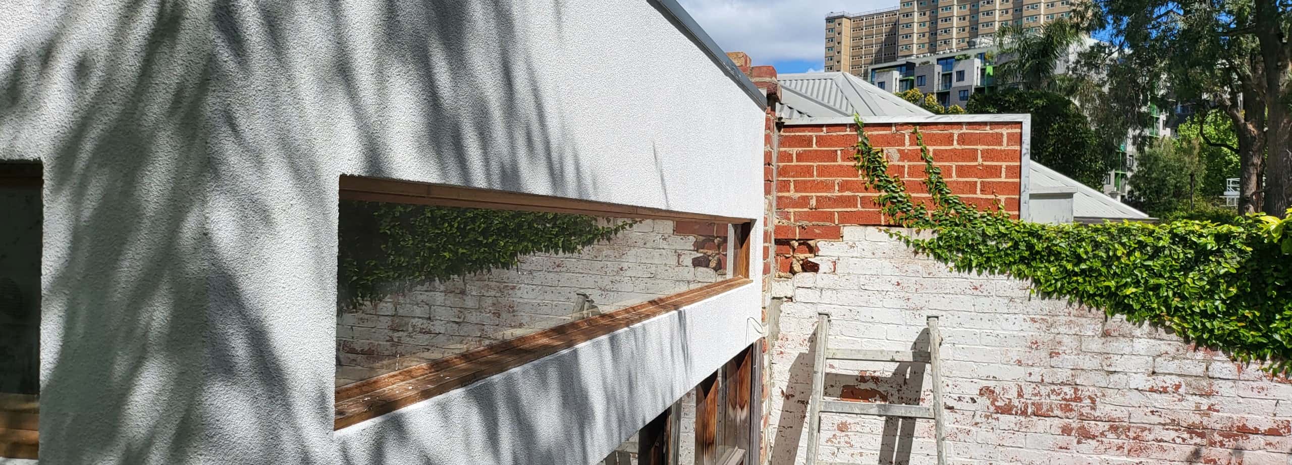 Rendered and painted wall at melbourne home