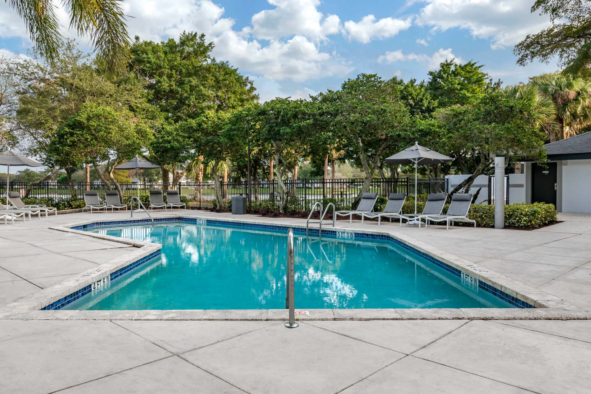 The patio and outdoor pool at The Reserve at Ashley Lake.