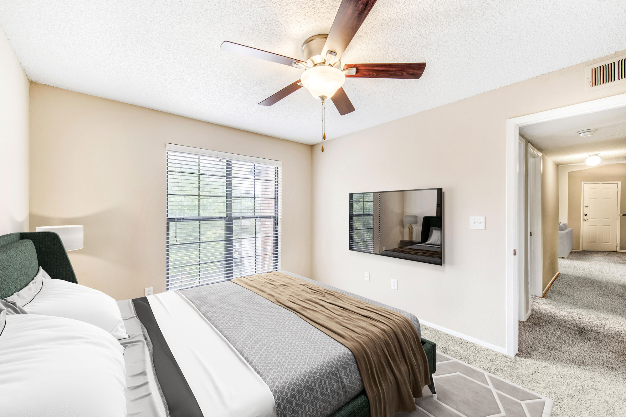 A bedroom at Canyon Chase apartments in Westminster, CO.