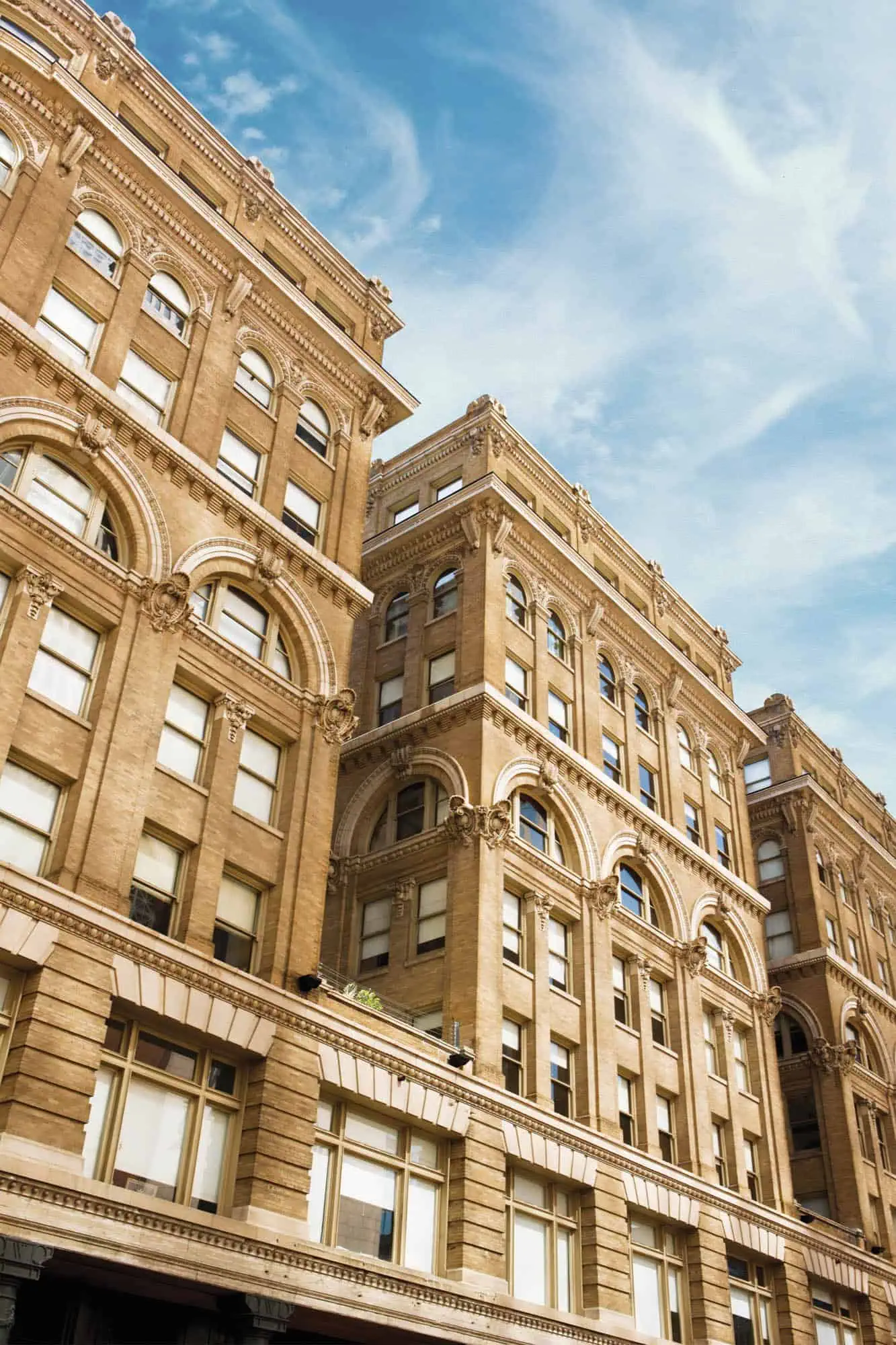 Vertical view of The Wilson apartments in Mercantile Place in Dallas, TX