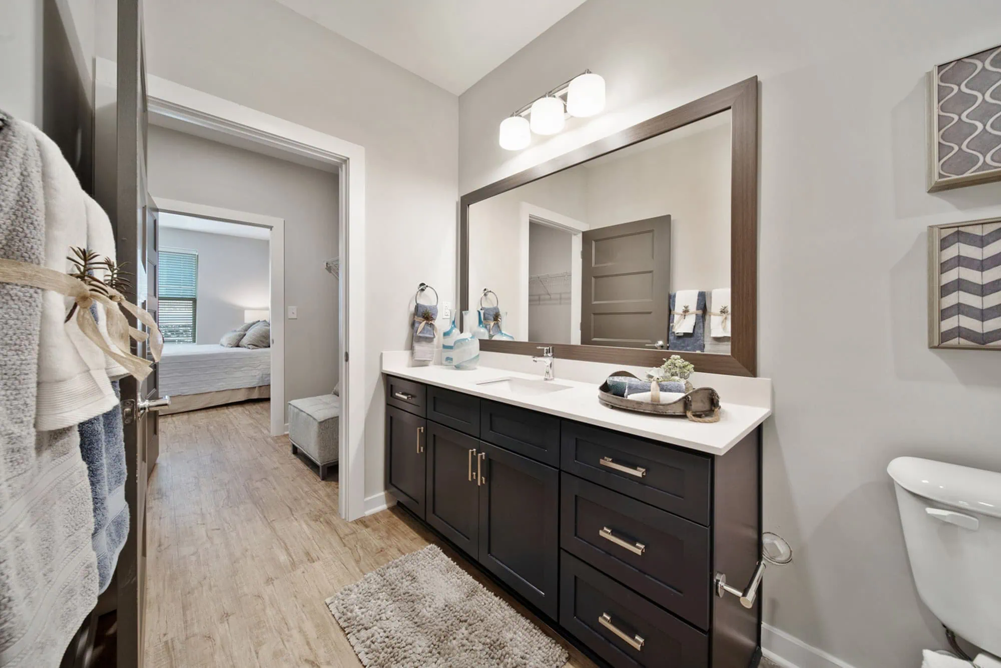 The bathroom in a Flats on Front apartment in Wilmington, NC.