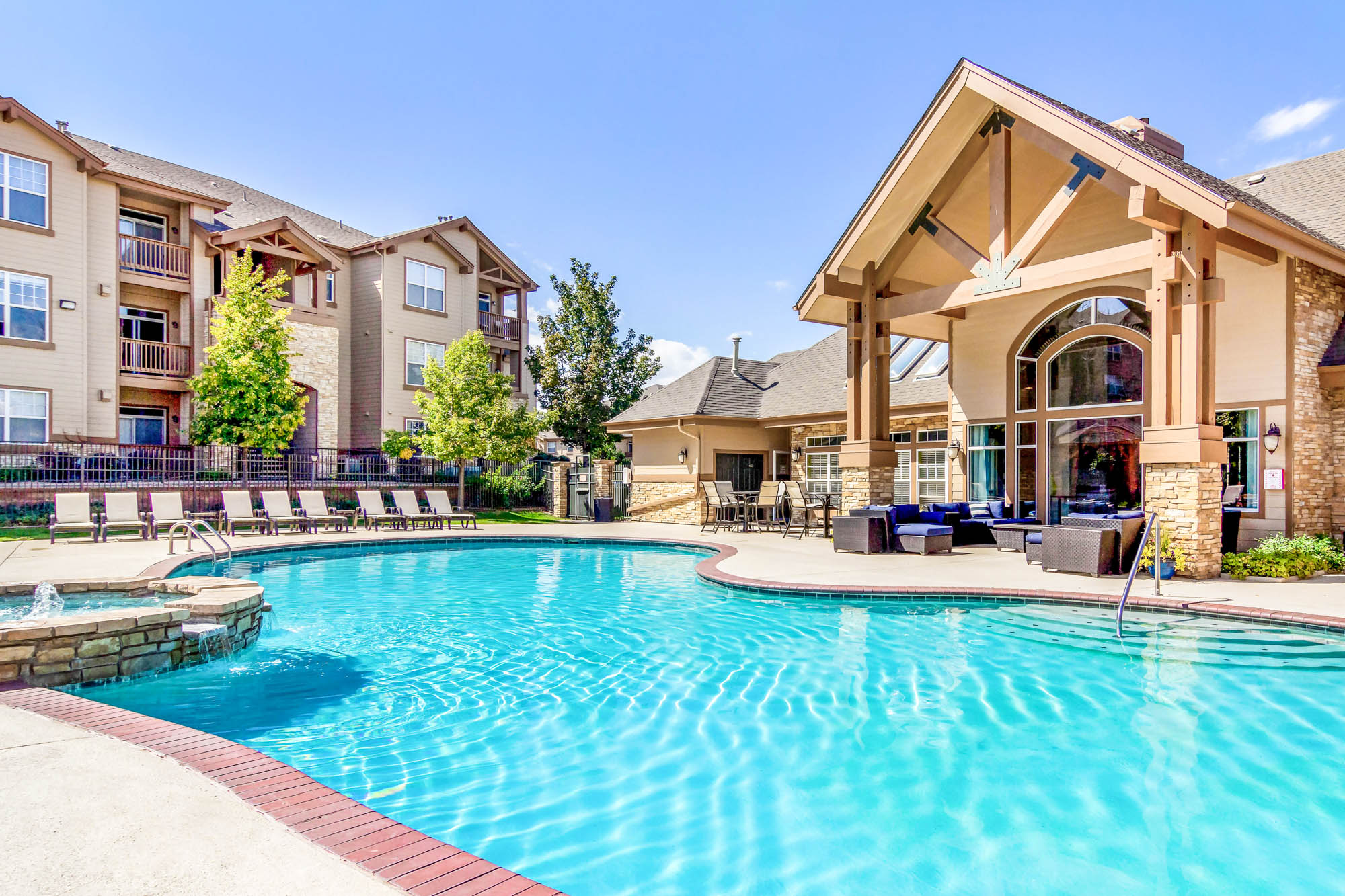 The pool at The Village at Legacy Ridge apartments near Denver, CO.