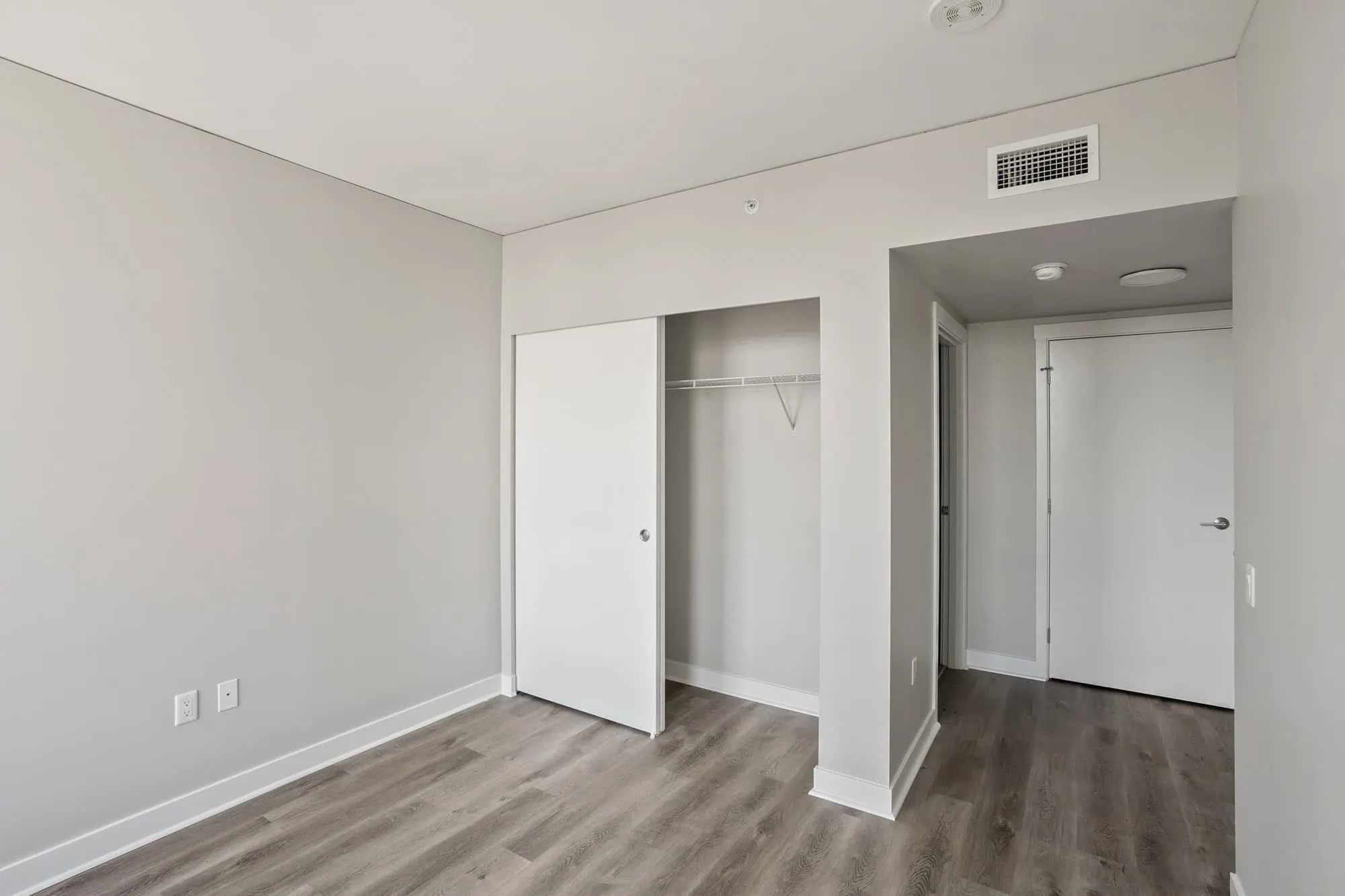 A bedroom in a Cielo luxury apartment in downtown Seattle.