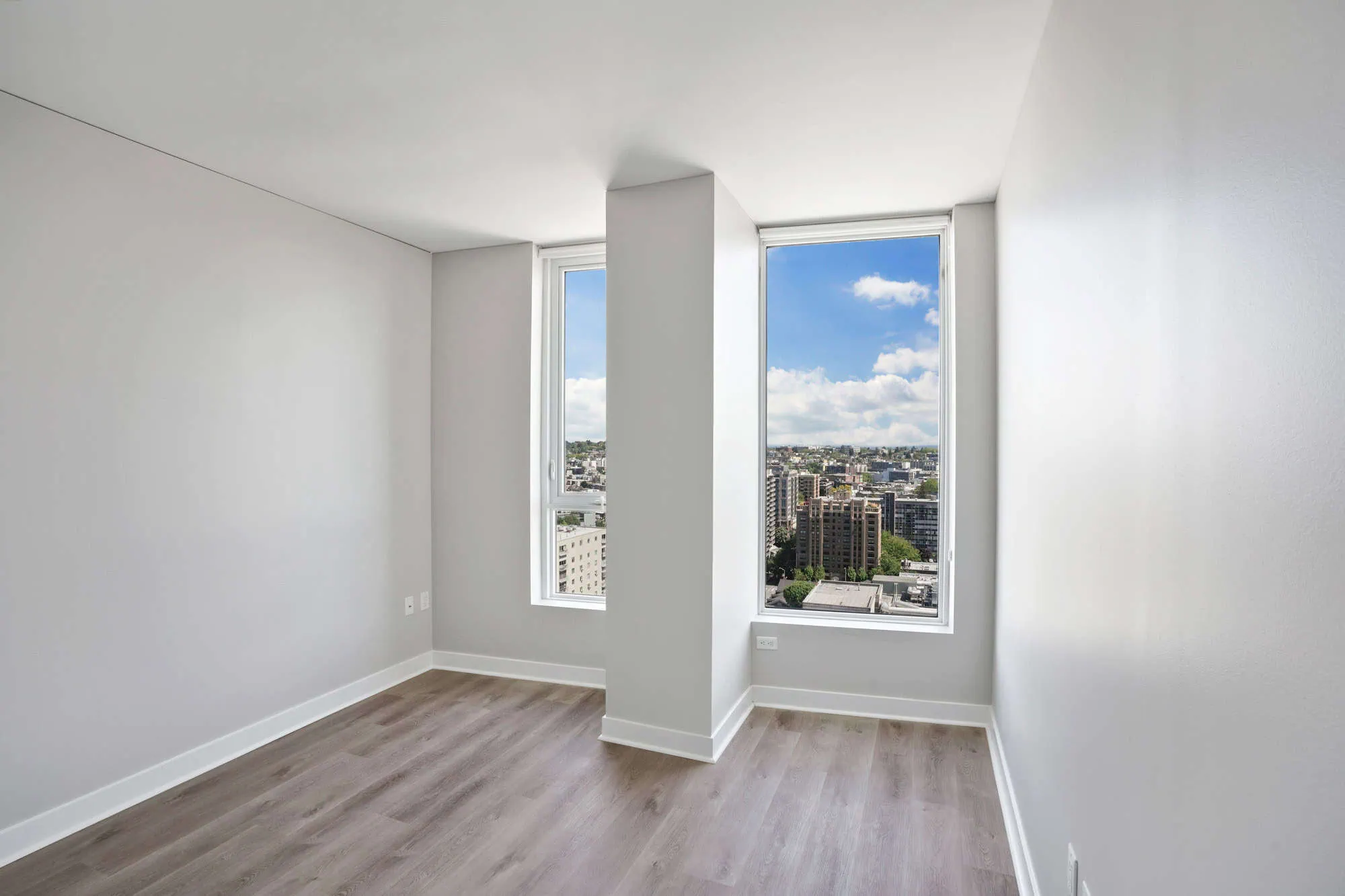 A bedroom in a Cielo luxury apartment in downtown Seattle.