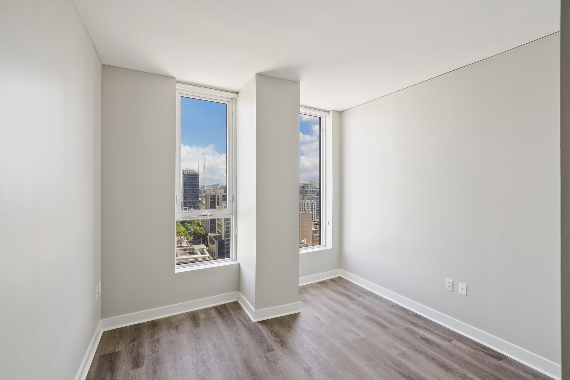 A bedroom in a Cielo luxury apartment in downtown Seattle.