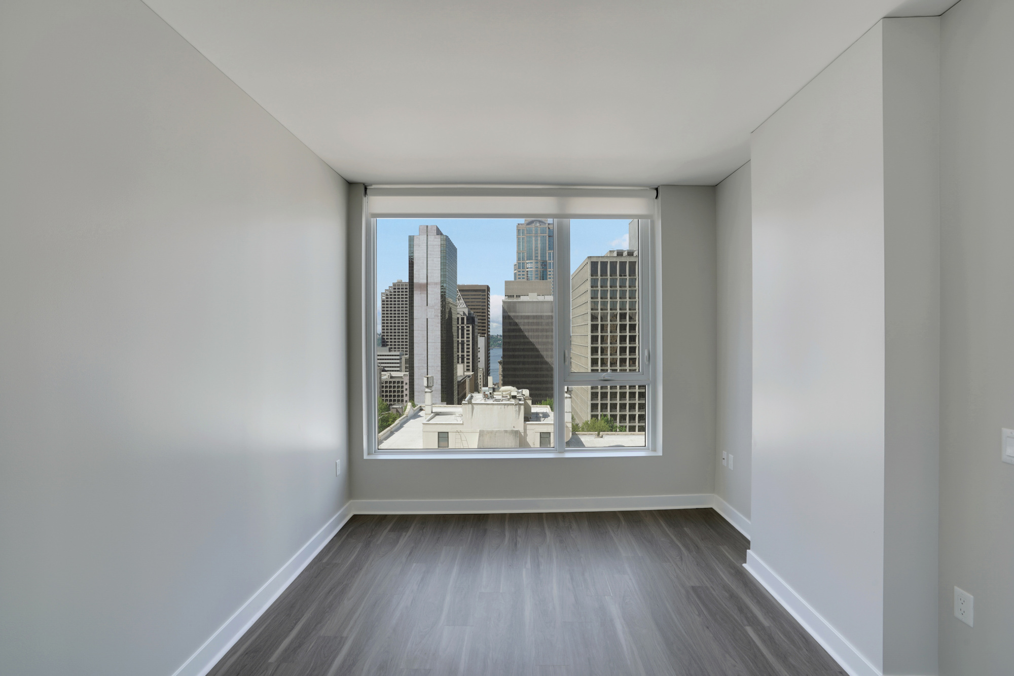 A bedroom in a Cielo luxury apartment in downtown Seattle.
