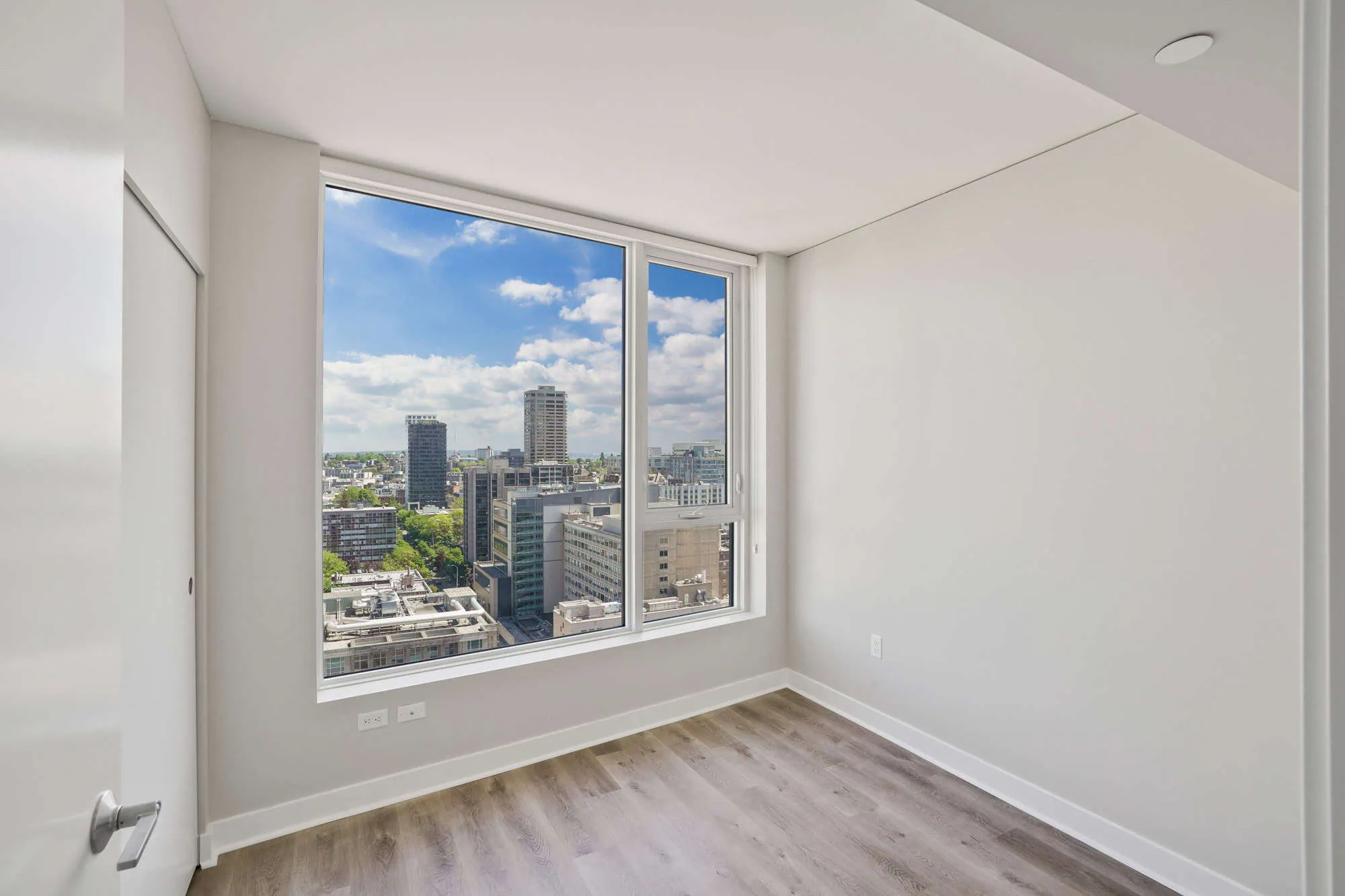 A bedroom in a Cielo luxury apartment in downtown Seattle.