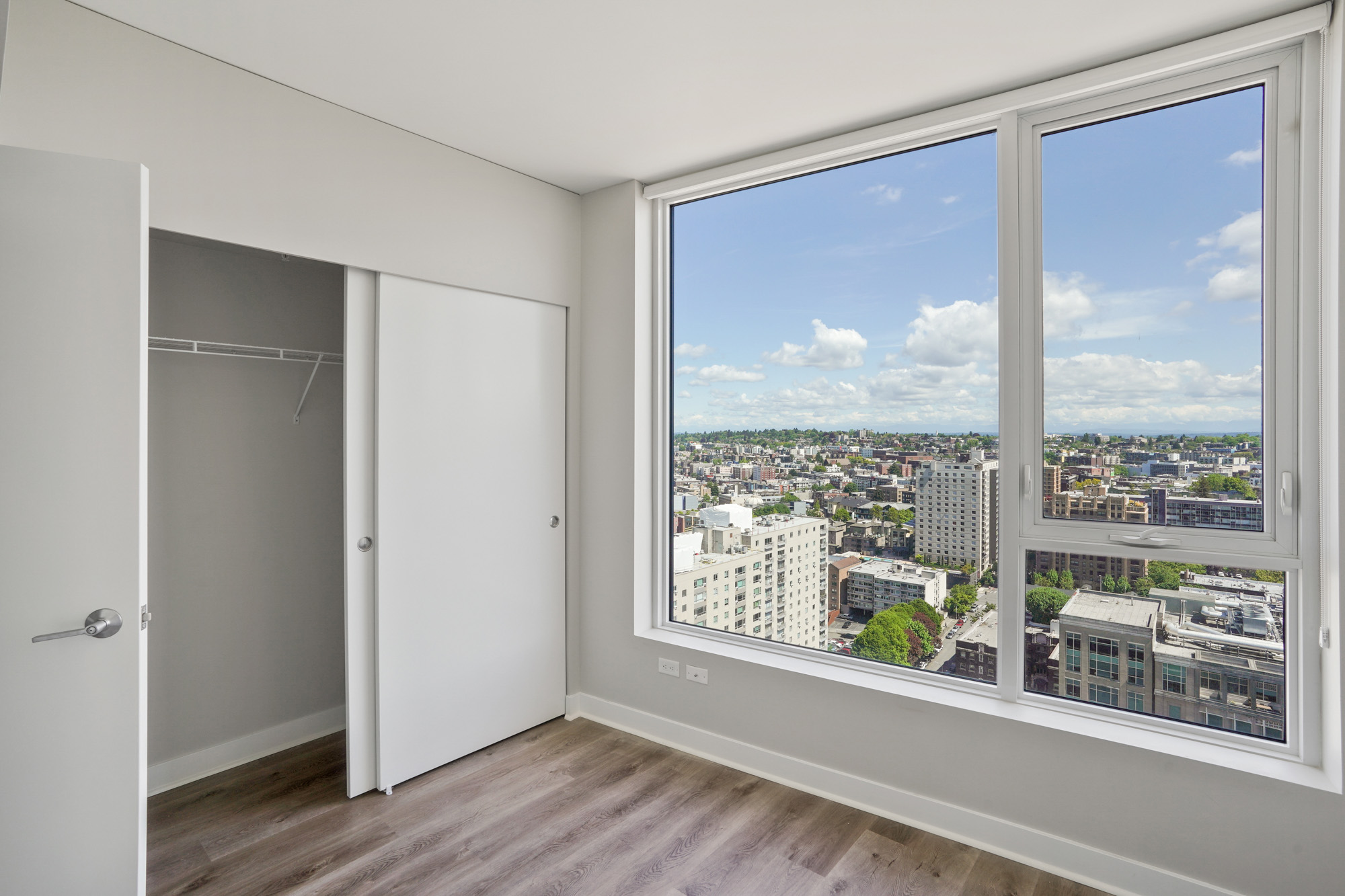 A bedroom in a Cielo luxury apartment in downtown Seattle.