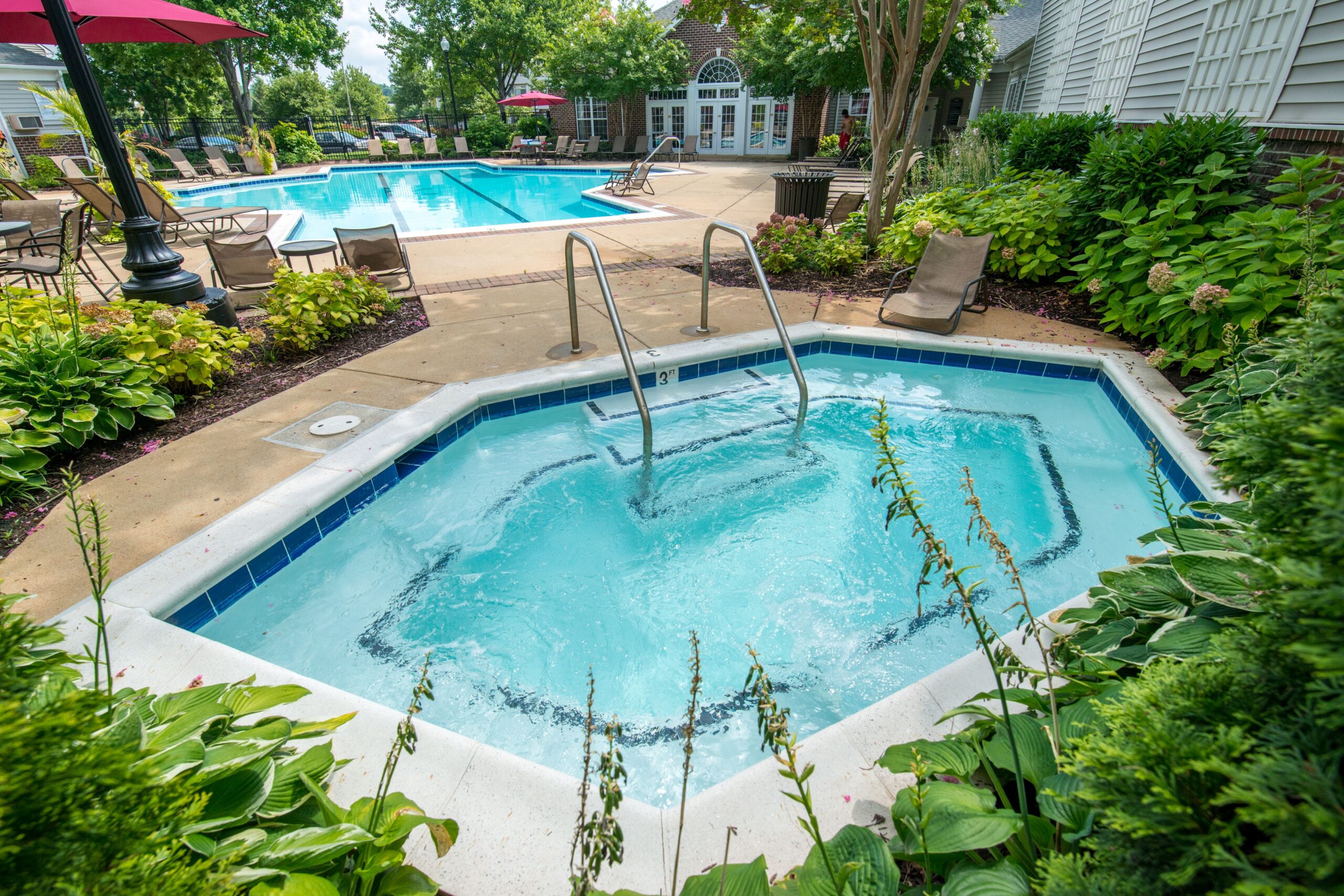 Jacuzzi next to the pool at Cameron Court.
