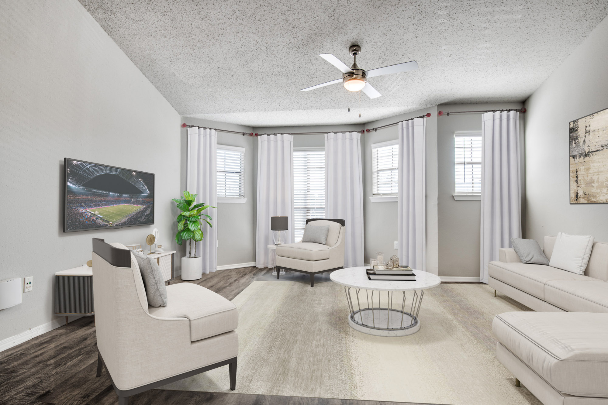 The living area in an apartment at The Arbors of Las Colinas in Irving, Texas.