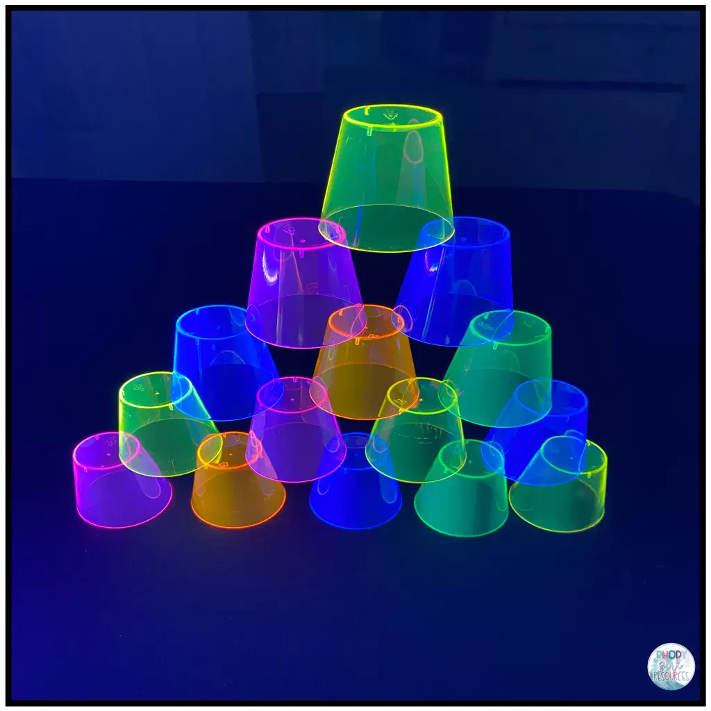 Neon cups stacked in a tower. 