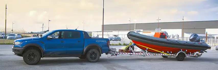 Secure the RIB to the trailer using transom tie-down straps @ RIBs ONLY - Home of the Rigid Inflatable Boat