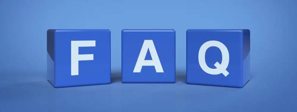 Wooden blocks displaying the letters FAQ
