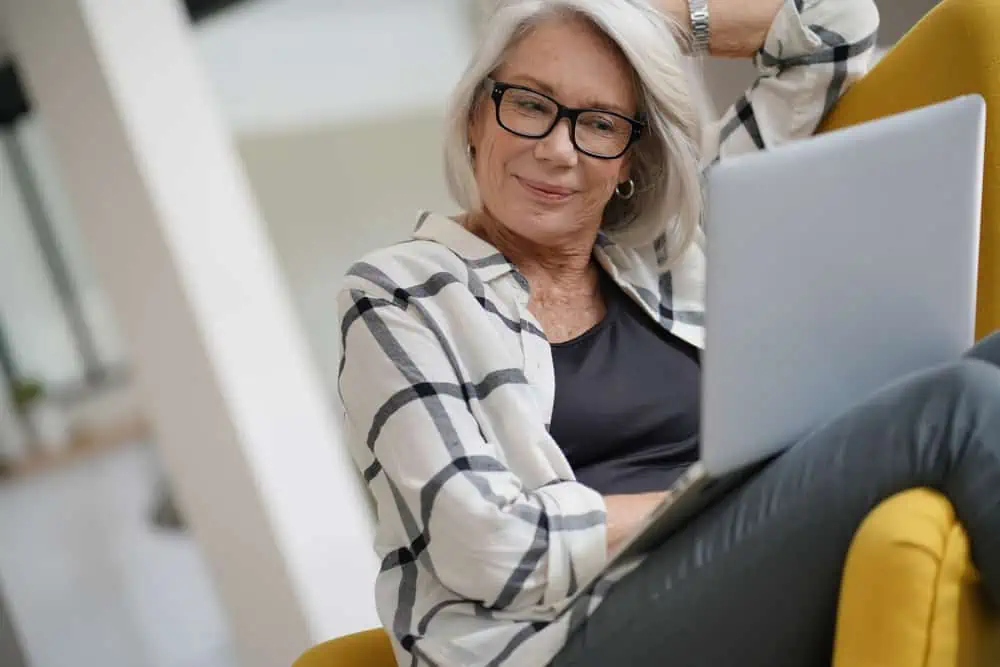 Woman studying an online course on her laptop