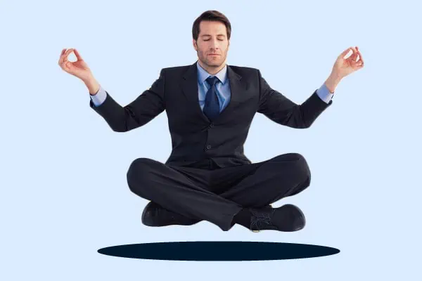 A businessman in the lotus position