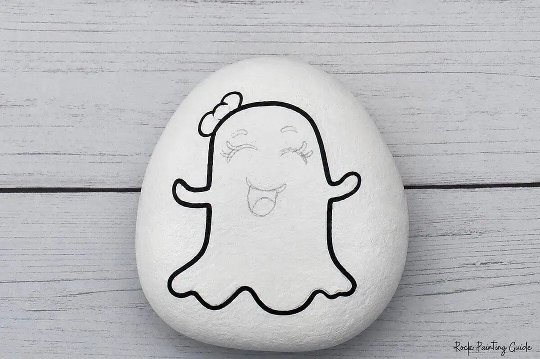 Easy Ghost Painted Rocks: Cute Ghost Emoji Rock Painting Tutorial 6 black outline on ghost painted rock