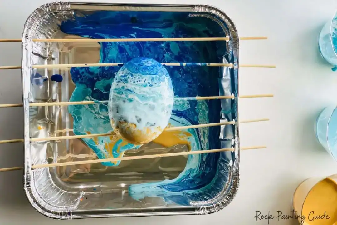 Beginner’s Guide to Paint Pouring on Rocks (With No-Fail Tips!) 12 paint pouring tray diy