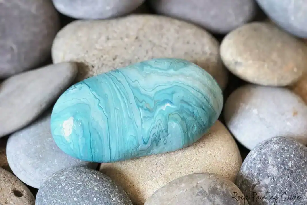 Beginner’s Guide to Paint Pouring on Rocks (With No-Fail Tips!) 18 paint pouring on rocks