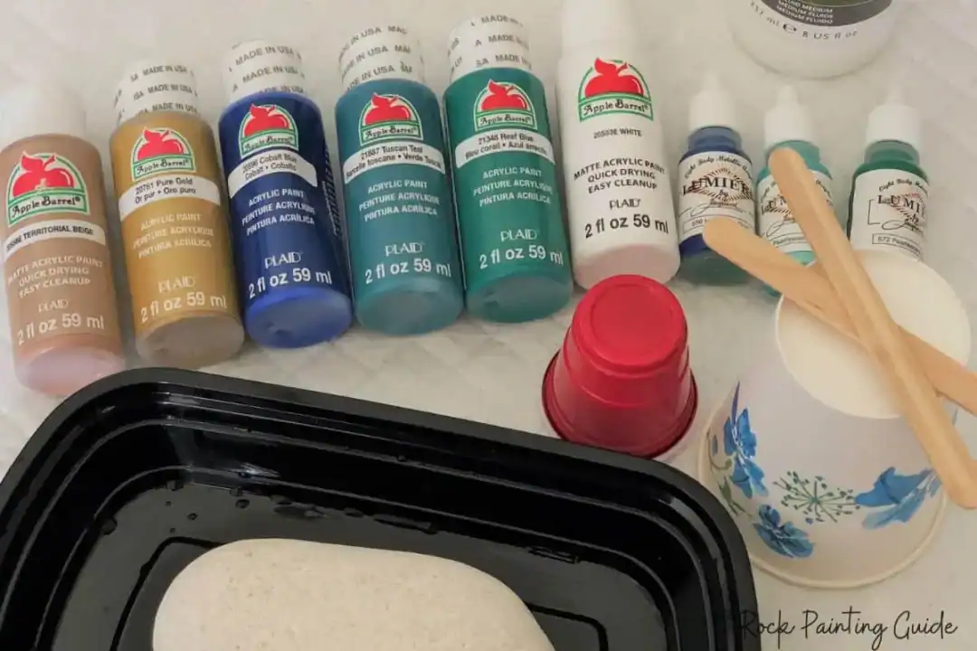 Beginner’s Guide to Paint Pouring on Rocks (With No-Fail Tips!) 13 paint pouring supplies