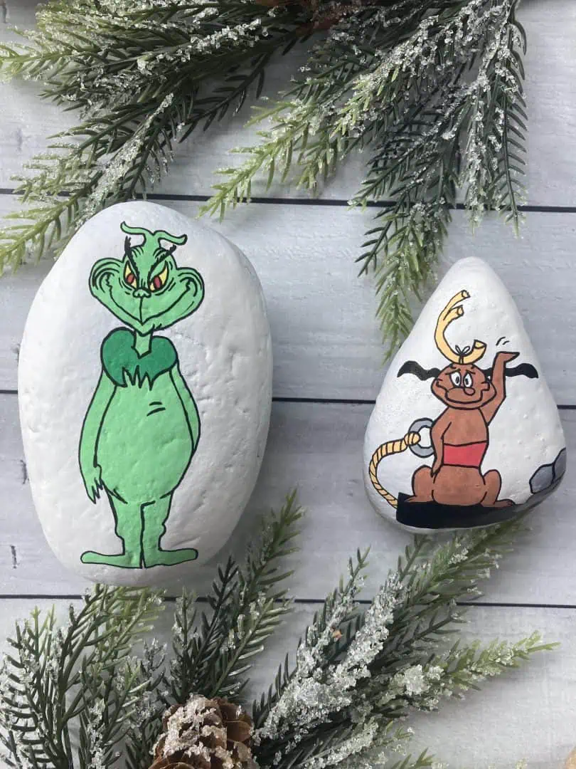 75+ of the Best Christmas Painted Rocks of Instagram 9 grinch and max painted rocks