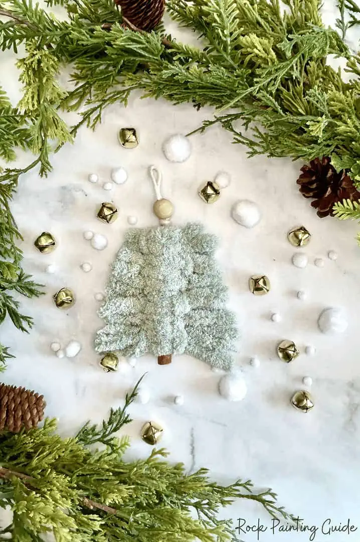 Perfect Macrame Christmas Trees Craft for Teens to try this Season 15 sage green macrame christmas tree displayed