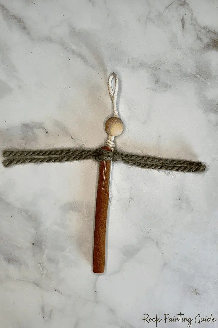 Perfect Macrame Christmas Trees Craft for Teens to try this Season 10 pull yarn ends through opposite loops to make the first knot